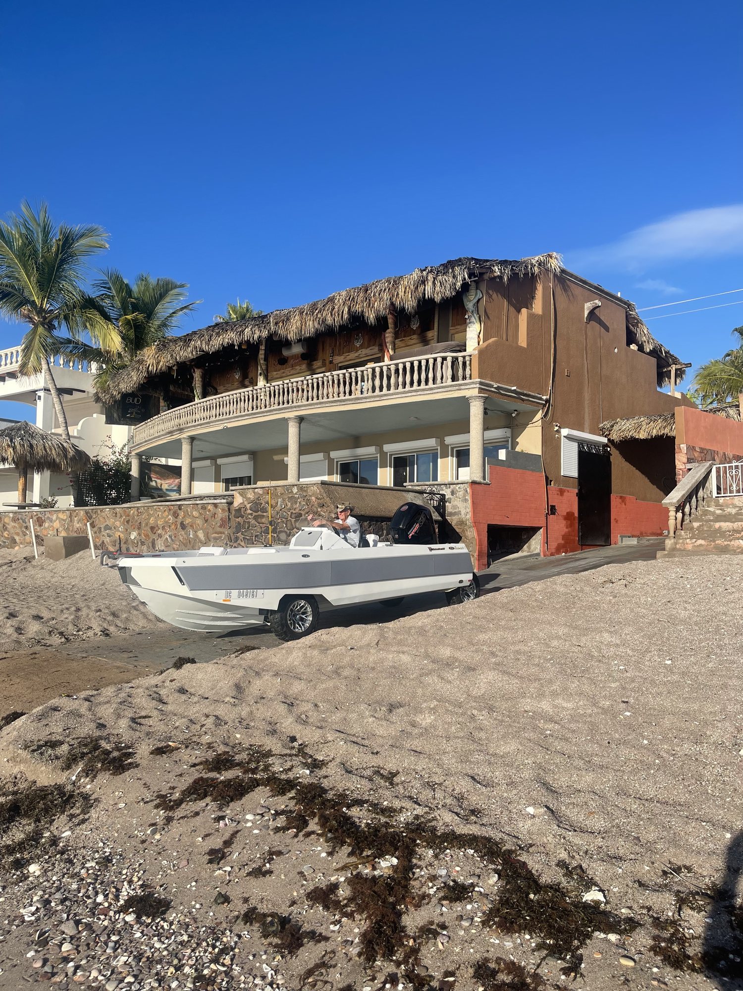 Bud driving his white WaterCar up from the beach in San Carlos, Mexico