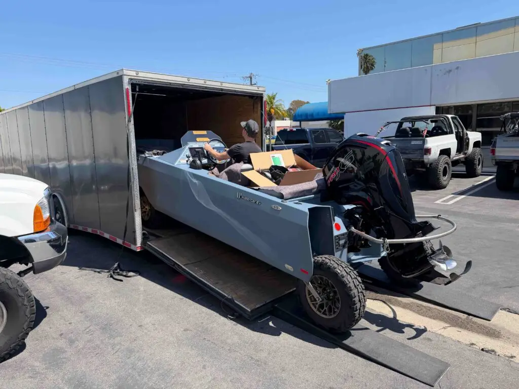 Cam’s WaterCar entering its enclosed transport trailer
