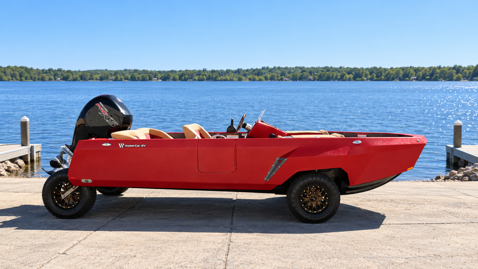 Side profile of a red WaterCar parked on a lakeside launch ramp.