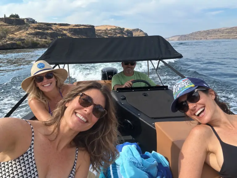 Friends enjoying a day on the water aboard a WaterCar