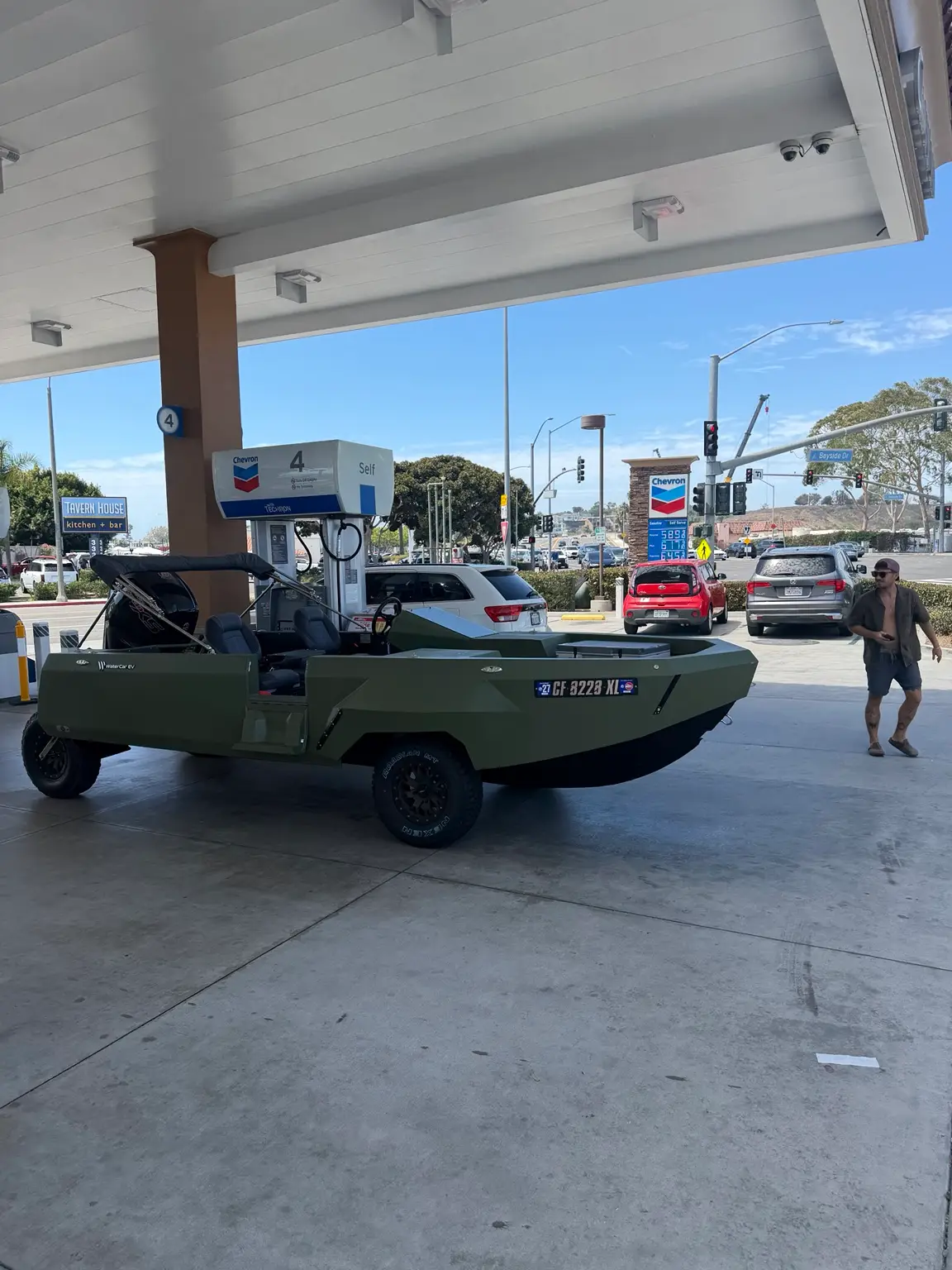 Dave March’s green WaterCar at a local fuel stop